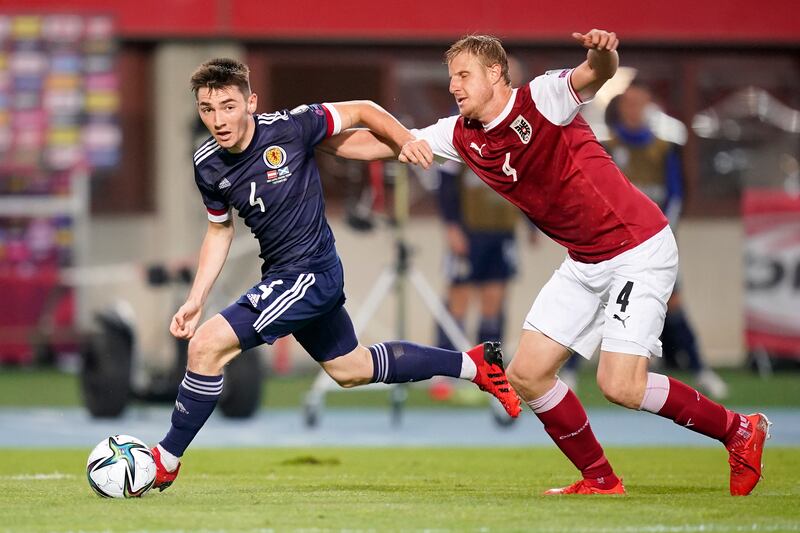 Billy Gilmour of Scotland battles for possession with Martin Hinteregger of Austria. Getty Images