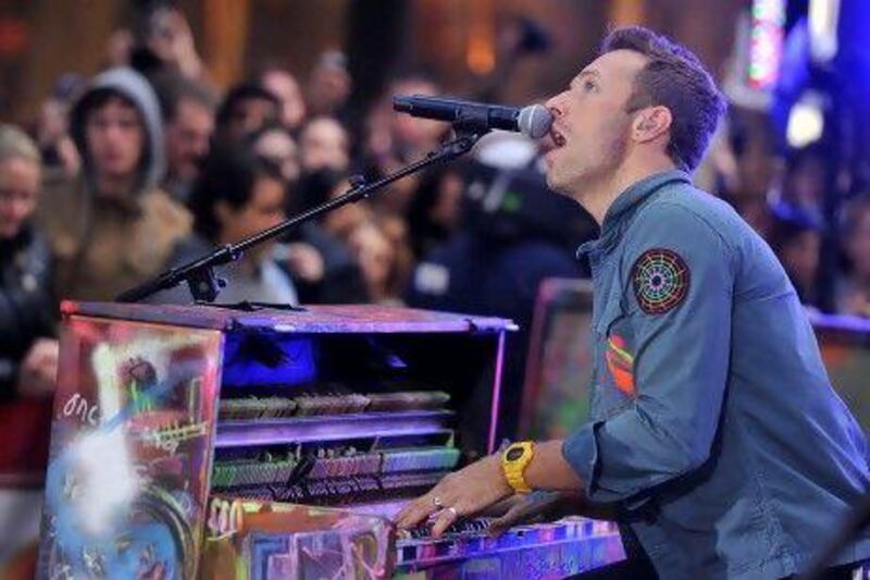 Chris Martin is the lead singer of Coldplay that will perform on Abu Dhabi’s Corniche on December 31. Stephen Lovekin / Getty Images /AFP