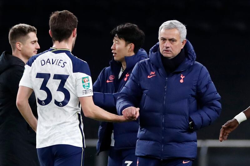 Soccer Football - Carabao Cup - Semi Final - Tottenham Hotspur v Brentford - Tottenham Hotspur Stadium, London, Britain - January 5, 2021 Tottenham Hotspur manager Jose Mourinho with Ben Davies after the match REUTERS/Paul Childs EDITORIAL USE ONLY. No use with unauthorized audio, video, data, fixture lists, club/league logos or 'live' services. Online in-match use limited to 75 images, no video emulation. No use in betting, games or single club /league/player publications.  Please contact your account representative for further details.