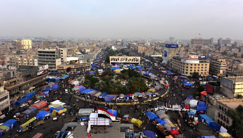 Iraqi protesters gather during the ongoing protests at the Al Tahrir square in central Baghdad. EPA