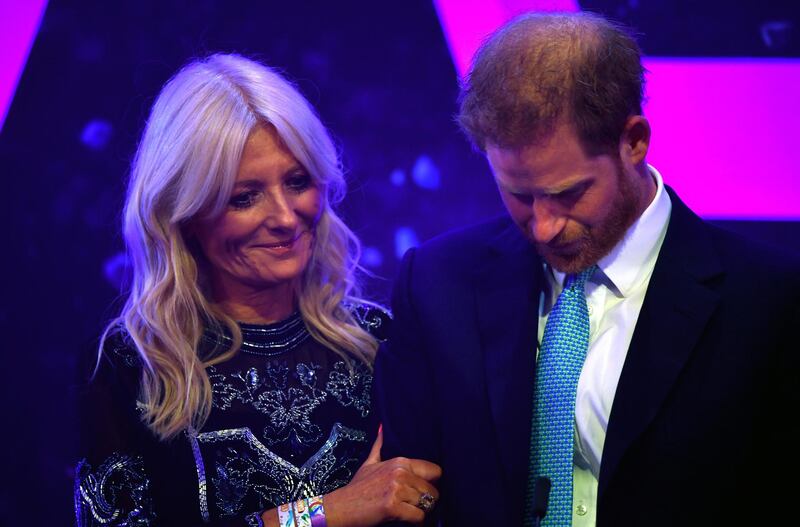 Britain's Prince Harry reacts next to television presenter Gaby Roslin as he delivers a speech during the WellChild Awards Ceremony reception in London, Britain, October 15, 2019. Reuterss