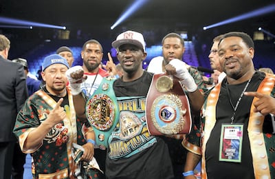 LAS VEGAS, NV - JULY 23:  WBO junior welterweight champion Terence Crawford (C) poses with members of his team after his unanimous decision victory over WBC champion Viktor Postol of Ukraine at MGM Grand Garden Arena on July 23, 2016 in Las Vegas, Nevada.  (Photo by Steve Marcus/Getty Images)