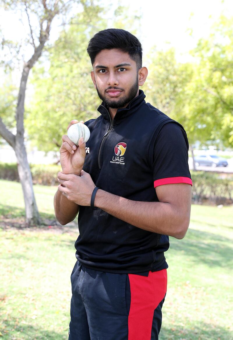 ABU DHABI, UNITED ARAB EMIRATES , March 26 – 2020 :- Yodhin Punja, the youngest cricketer to represent the UAE in both First Class and One Day Internationals. He is a student at Cardiff University but is back in Abu Dhabi for a break as the Universities in the UK are closed due to the spread of Coronavirus. He is at the Khaldia park near the corniche in Abu Dhabi. (Pawan Singh / The National) For Sports. Story by Amith