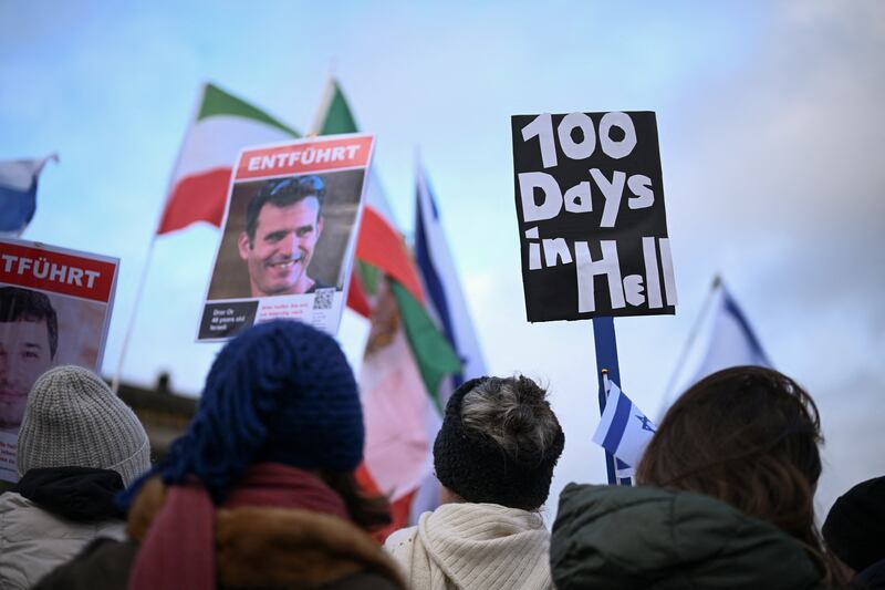 Protesters at the Berlin march with family members of German citizens who have been held by Hamas for 100 days. Reuters