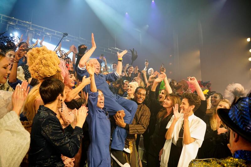 Jean Paul Gaultier celebrate on the runway after presenting his final collection in Paris, France. Getty