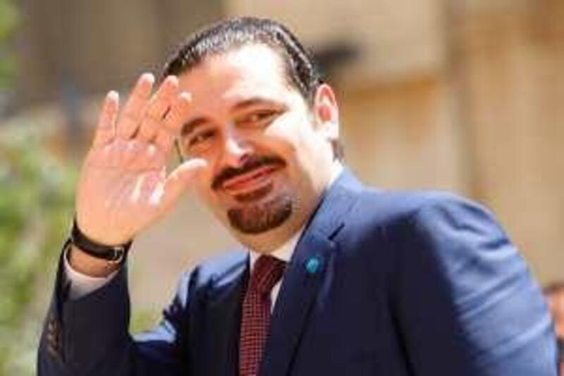 Lebanese majority leader lawmaker Saad Hariri gestures as he arrives at the Parliament for the election of the house speaker in Beirut, Lebanon, Thursday, June 25, 2009. Lebanese lawmakers overwhelmingly re-elected the pro-Hezbollah parliament speaker Nabih Berri  on Thursday despite the Iranian-backed militant group's recent election loss, signaling the political factions' determination to work together toward a unity government. (AP Photo/Hussein Malla)