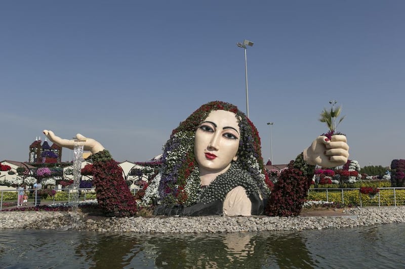 A sculpture of a woman adorned with flowers at Dubai Miracle Garden. Reem Mohammed / The National   