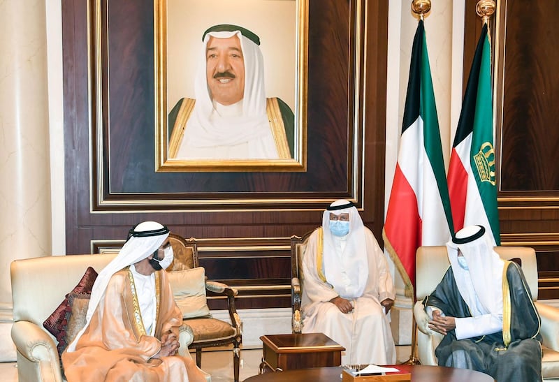 Sheikh Mohammed bin Rashid meets Kuwait's new Emir Sheikh Nawaf Al Sabah to offer condolences following the death of Sheikh Sabah, at the Emiri Terminal of Kuwait International Airport. AFP