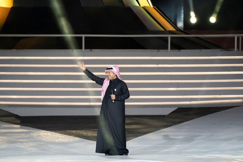 ABU DHABI, UNITED ARAB EMIRATES - March 21, 2019: Rashed Al Majed (C) sings during the closing ceremony of the Special Olympics World Games Abu Dhabi 2019, at Zayed Sports City.

( Rashed Al Mansoori / Ministry of Presidential Affairs )
---