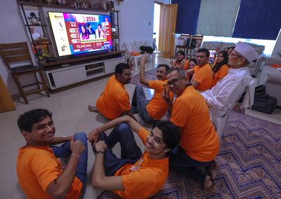 BJP supporters from Abu Dhabi watch the election counting in India as the party headed by Narendra Modi holds on to power with support of allies. Victor Besa / The National