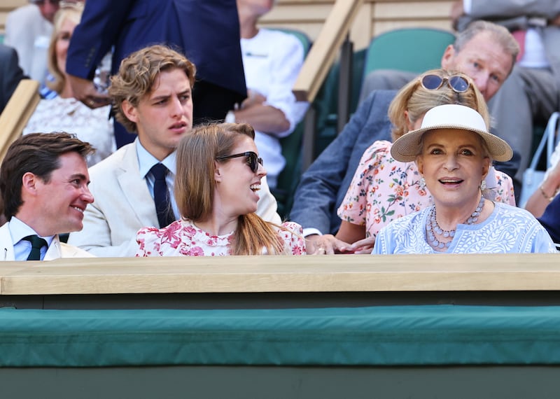 Britain's Princess Beatrice, centre, her husband Edoardo Mapelli Mozzi, left, and Princess Michael of Kent, right, attend the semi-final matches at Wimbledon's Centre Court. EPA