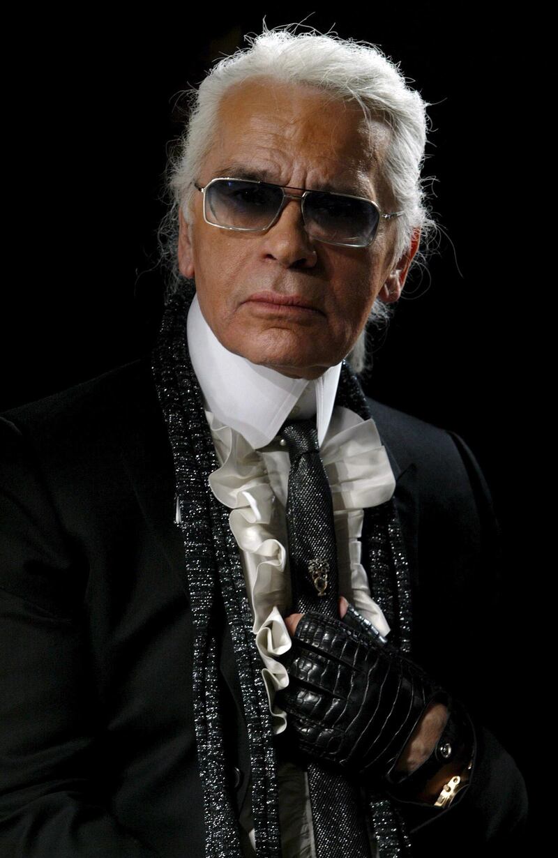 epa07380879 (FILE) Fashion designer Karl Lagerfeld poses for photographers before the start of his Fall 2006 Lagerfeld Collection showing at Olympus Fashion week in New York, USA, 10 February 2006 (reissued 19 February 2019). Lagerfeld has died on 19 February 2019. He was 85.  EPA/JASON SZENES *** Local Caption *** 00636492