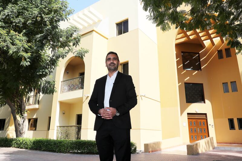 Maroun Farah outside his building in The Gardens in Dubai. Pawan Singh / The National