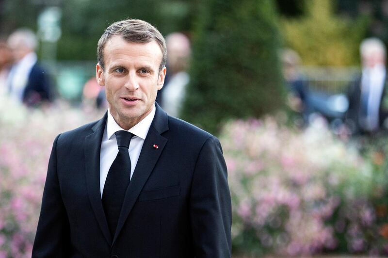 epa07072255 French President Emmanuel Macron arrives with the Spanish Royal Couple to visit the Miro exhibition at the Grand Palais Museum in Paris, France, 05 October 2018.  EPA/ETIENNE LAURENT