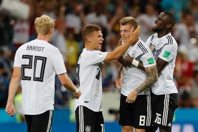 From left, Germany's Julian Brandt, Joshua Kimmich, Toni Kroos and Antonio Ruediger celebrate their team's 2-1 victory at the of the group F match between Germany and Sweden at the 2018 soccer World Cup in the Fisht Stadium in Sochi, Russia, Saturday, June 23, 2018. (AP Photo/Frank Augstein)