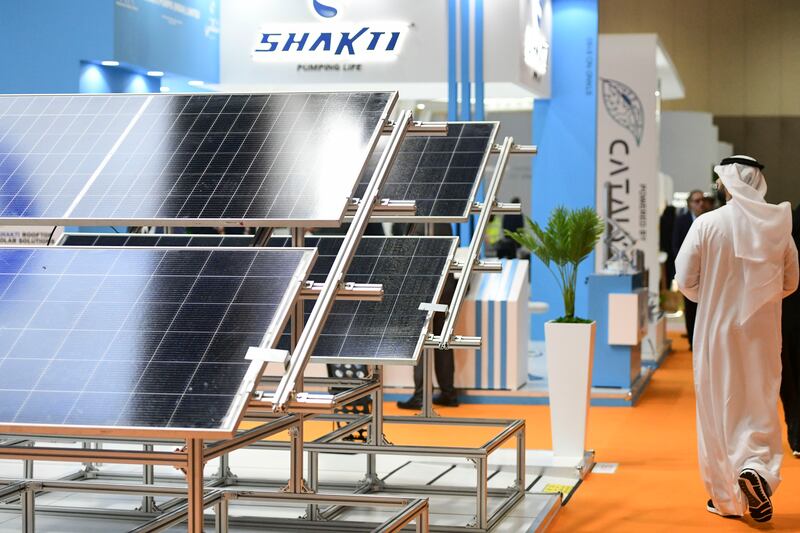Solar panels on display at Abu Dhabi Sustainability Week in January. Khushnum Bhandari / The National