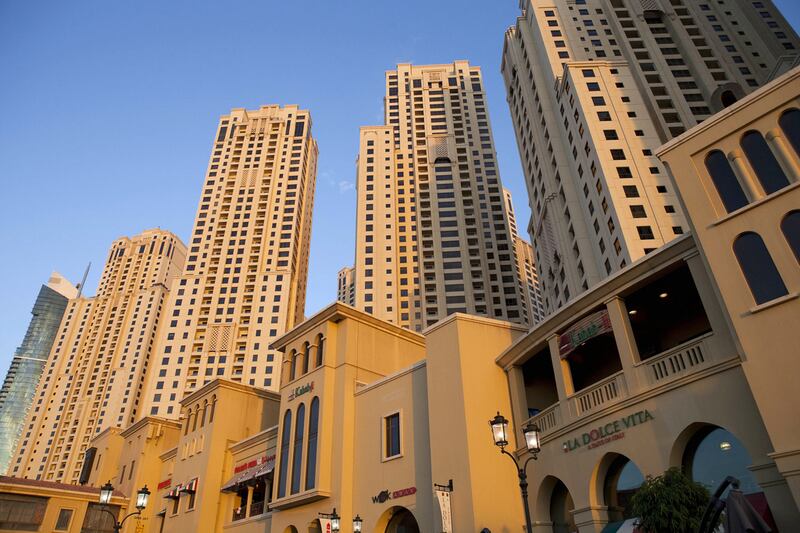 Dubai apartment prices remained flat for a second consecutive quarter as buyers continued to be put off by the introduction of mortgage caps by the Central Bank and a hike in transfer fees. Razan Alzayani / The National