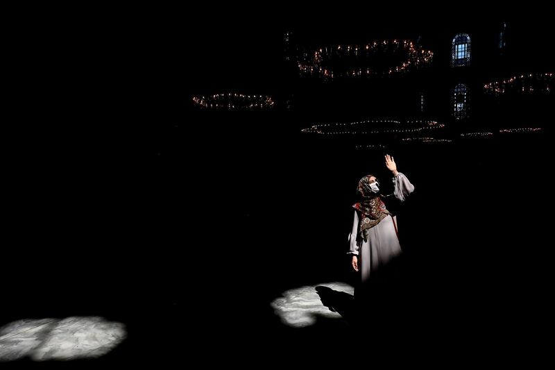 A tourist wearing a protective face mask walks inside the Hagia Sophia Museum in Istanbul. AFP