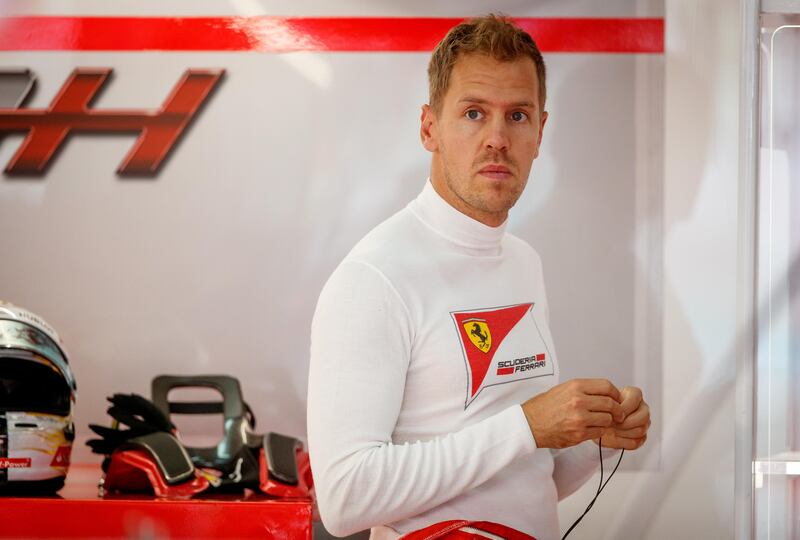 KUALA LUMPUR, MALAYSIA - SEPTEMBER 30:  Sebastian Vettel of Germany and Ferrari looks on in the garage during final practice for the Malaysia Formula One Grand Prix at Sepang Circuit on September 30, 2017 in Kuala Lumpur, Malaysia.  (Photo by Lars Baron/Getty Images)