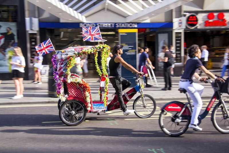 A particularly patriotic pedicab outside Bond Street Station. Shahzad Sheikh for The National