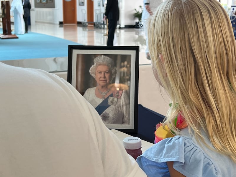 Mourners queued to sign the book of condolence at the QE2 in Dubai. Andrew Scott / The National