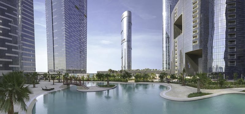 Sun and Sky Tower stand behind Gate Towers and The Arc. Courtesy Abu Dhabi Planning Council