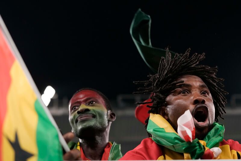 Fans cheer prior to the start of the Group H match between Portugal and Ghana at the Stadium 974. AP Photo