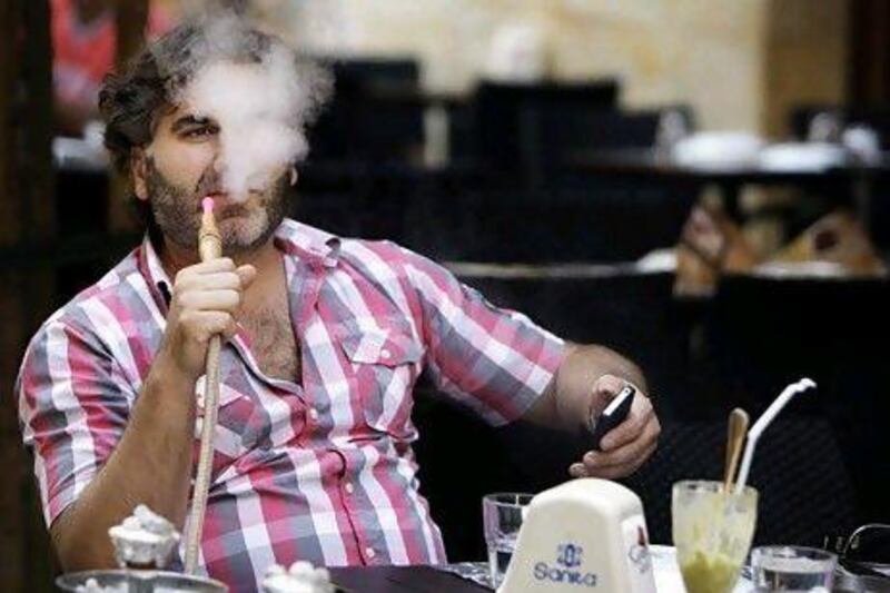 Although the Lebanese enjoy smoking, a ban will only do its people a world of good for all the right reasons. Bilal Hussein / AP Photo