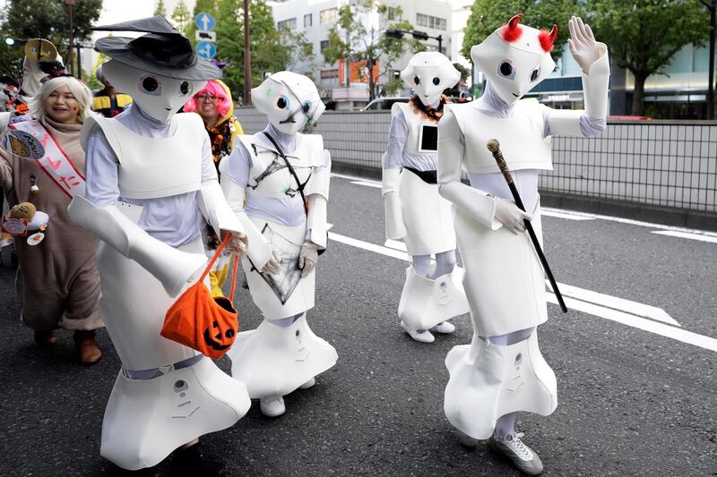 Participants in costumes wait for a Halloween parade in Kawasaki. EPA