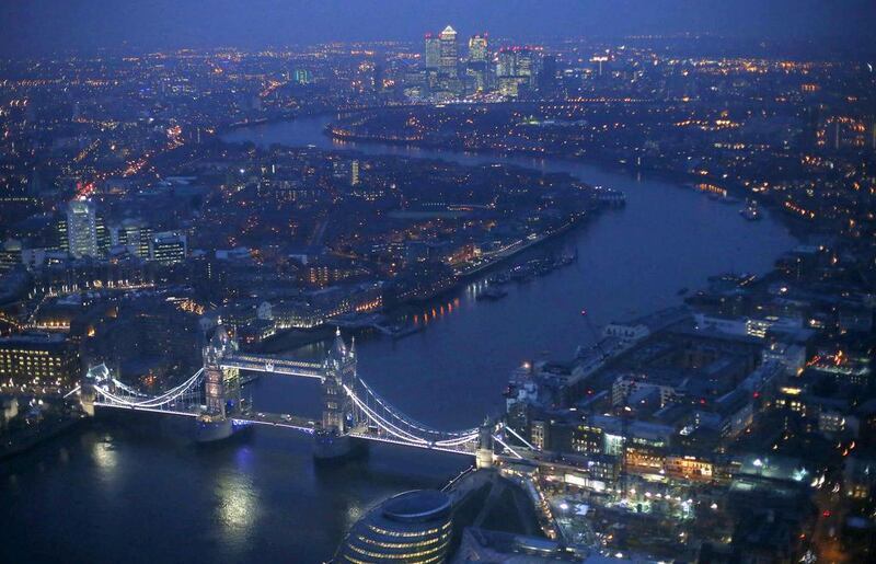 Tower Bridge and the Canary Wharf financial district on London’s East End. Andrew Winning / Reuters