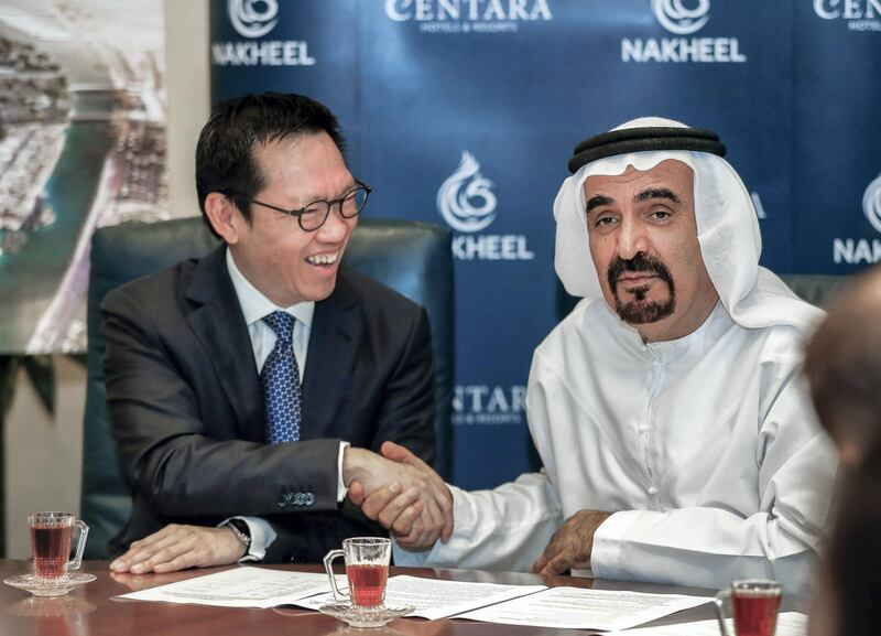 Abu Dhabi, U.A.E., July 26, 2018.  Signing ceremony and Q&A with Nakheel and Centara Hotels.  (R-L) Ali Rashid Lootah, Chairman of Nakheel, and Mr Suparat Chirathivat, Executive Vice President, Corporate Development, Central Group, parent company of Centara Hotels & Resorts. 
Victor Besa / The National
Section:  BZ
Reporter:  Sarah Townsend