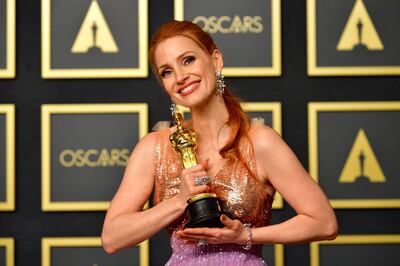 US actress Jessica Chastain poses with the award for Best Actress in a Leading Role. AFP