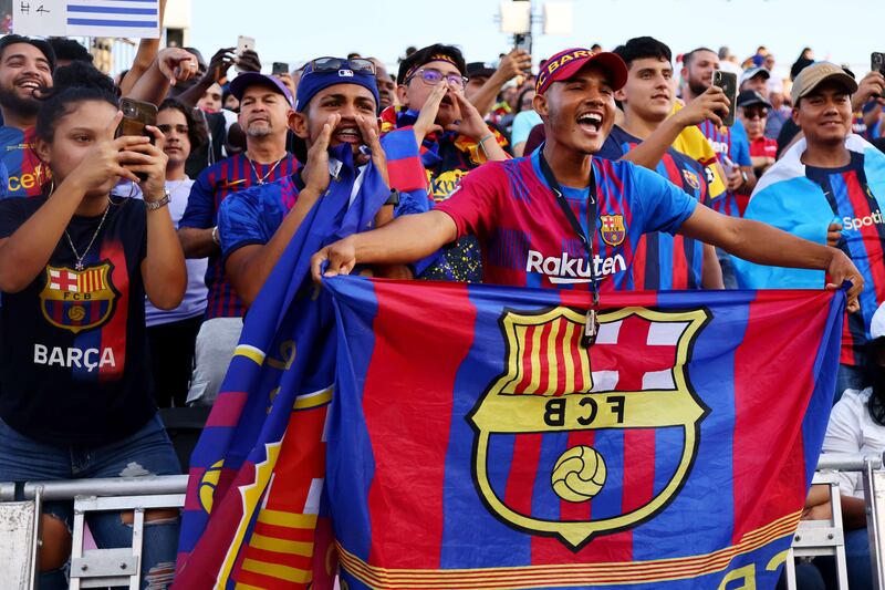 Barcelona fans cheer from the stands during the first half of a preseason friendly against Inter Miami. Getty

