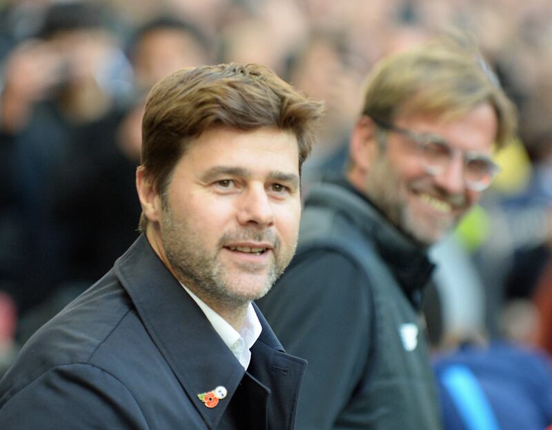 epa06282806 Tottenham Hotspur manager Mauricio Pochettino (L) and Liverpool manager Juergen Klopp during the English Premier League soccer match between Tottenham Hotspur and Liverpool FC at Wembley in London, Britain, 22 October 2017.  EPA/GERRY PENNY EDITORIAL USE ONLY. No use with unauthorized audio, video, data, fixture lists, club/league logos or 'live' services. 
Online in-match use limited to 75 images, no video emulation. No use in betting, games or single club/league/player publications
