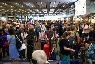 People queue to check in for the Eurostar rail service at St Pancras International Station in London, UK. Reuters