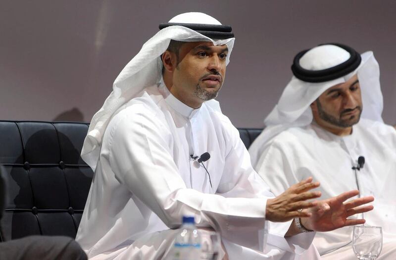 Abdullah Al Darmaki, the chief executive of Khalifa Fund for Enterprise Development, left, says SME loans will play a huge part in the returns of the UAE finance industry. Sammy Dallal / The National