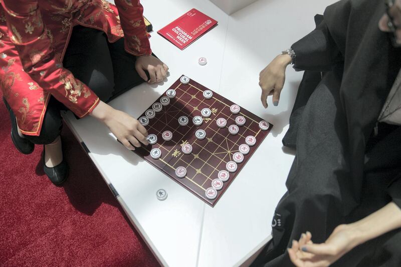 ABU DHABI, UNITED ARAB EMIRATES - JULY 18, 2018. 

An Emirati and a Chinese female play chinese chess at Manarat Al Saadiyat in Abu Dhabi. A pavilion to celebrate the UAE and Chinese culture was set up at the venue and will be the centerpiece of the UAE-China Week that runs until July 24.

(Photo by Reem Mohammed/The National)

Reporter: 
Section: NA