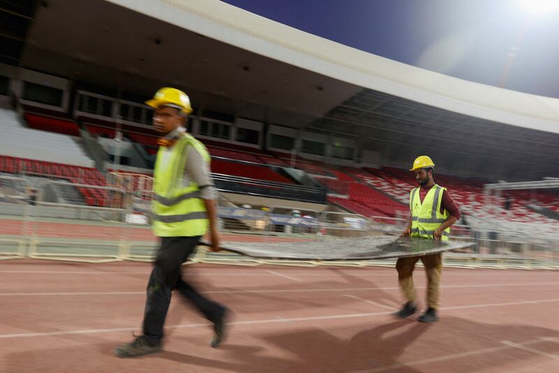 Workers prepare for the papal visit.