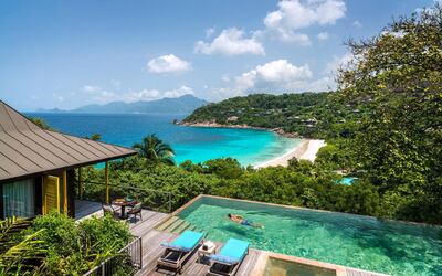 The tree house style villas and suites at Four Seasons Resort Seychelles come with private pools.