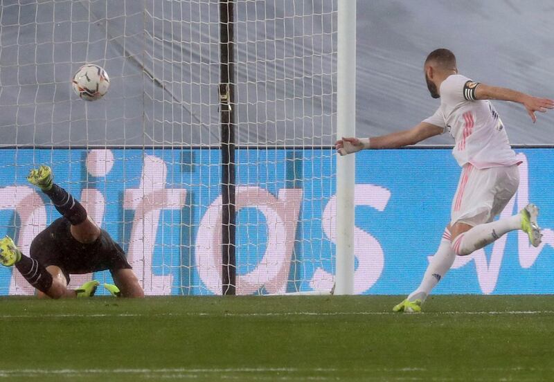 Real Madrid's French forward Karim Benzema scores the team's second goal past Eibar's goalie Marko Dmitrovic. EPA