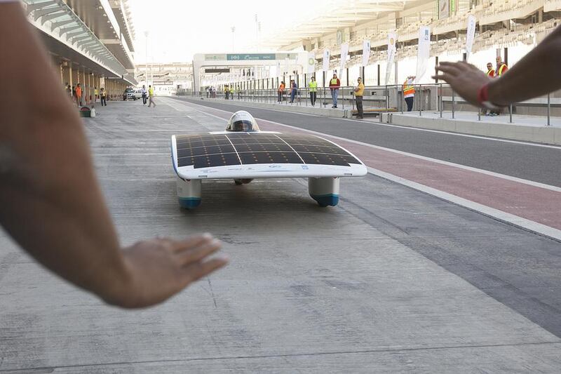 The Petroleum Institute team during the pitt stop. Abu Dhabi Solar Challenge (ADSC) the first International Solarcar Federation (ISF) sanctioned event in the Middle East marked it’s first day at Yas Marina Circuit. Mona Al Marzooqi / The National 