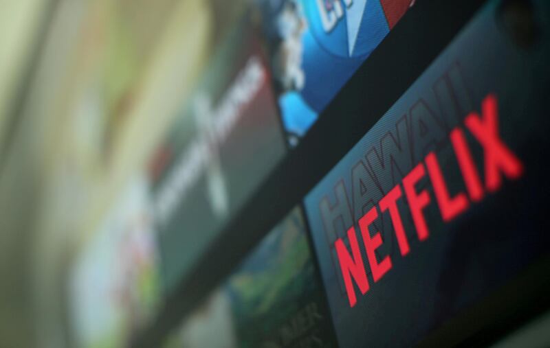 FILE PHOTO: The Netflix logo is pictured on a television in this illustration photograph taken in Encinitas, California, U.S., on January 18, 2017.  REUTERS/Mike Blake/File Photo                               GLOBAL BUSINESS WEEK AHEAD.   SEARCH GLOBAL BUSINESS 22 JAN FOR ALL IMAGES