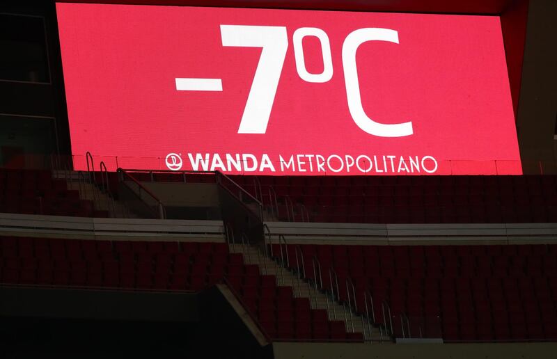 A big screen displays the temperature in the stadium in Madrid. Reuters