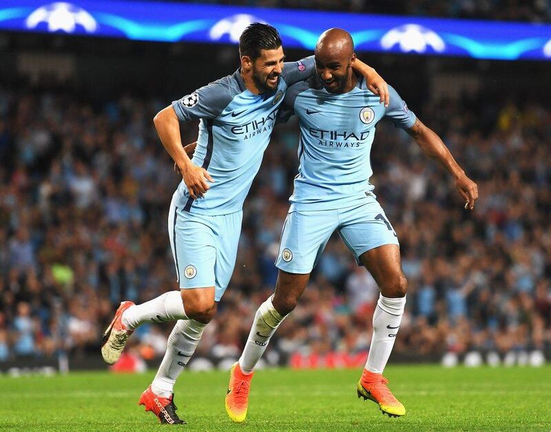 Fabian Delph, right, and Nolito celebrate scoring in a Champions League play-off against Steaua Bucharest. Michael Regan / Getty