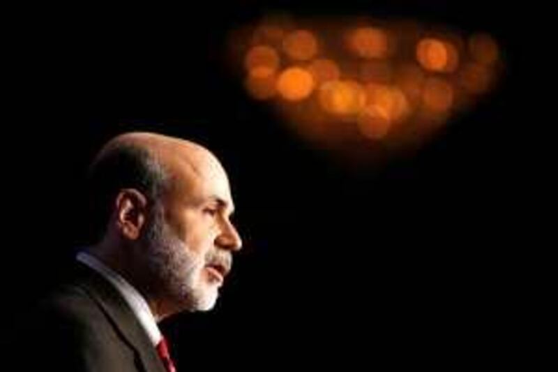 U.S. Federal Reserve Chairman Ben Bernanke speaks at the December luncheon meeting of the Economic Club of Washington, in this December 7, 2009 file photo. The combination of the financial nervous breakdown and the uneven economic recovery has turned central bankers into the equivalent of military generals waging a war. The question is whether, in the face of political opposition, they will deploy the weapons at their disposal. Picture taken December 7, 2009.   To match Special Report DAVOS/ECONOMY      REUTERS/Jason Reed/Files   (UNITED STATES - Tags: BUSINESS POLITICS) *** Local Caption ***  WAS406_DAVOS-ECONOM_0129_11.JPG
