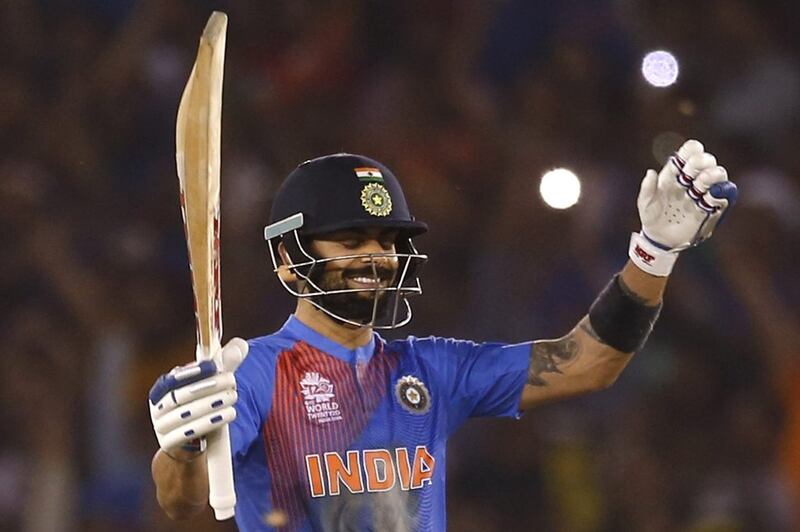 India's Virat Kohli celebrates after winning the match against Australia in the World Twenty20 on Sunday. Adnan Abidi / Reuters / March 27, 2016 