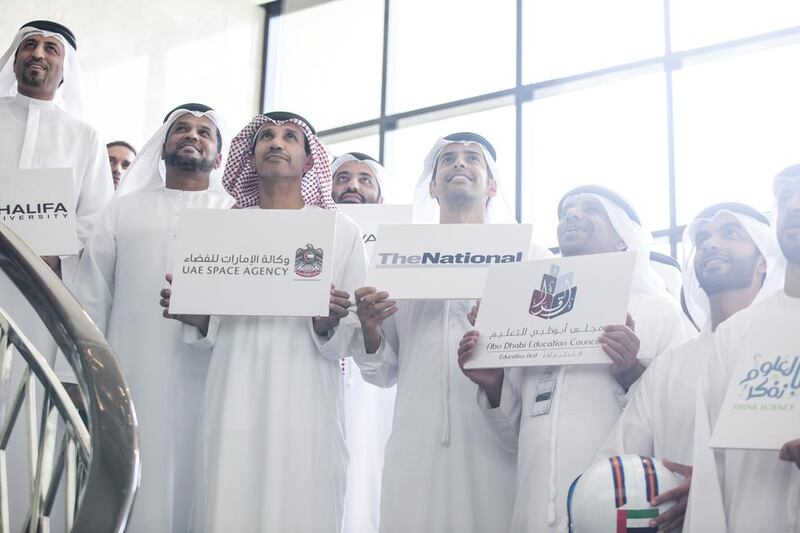 Mohammed Al Otaiba, Editor-in-Chief of The National, with the newspaper’s partners in The National Space Programme, which was launched on Tuesday. Silvia Razgova for The National