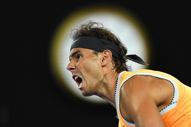 epaselect epa07308624 Rafael Nadal of Spain in action against Frances Tiafoe of the USA during their men's singles quarter final match of the Australian Open Grand Slam tennis tournament in Melbourne, Australia, 22 January 2019.  EPA/LUKAS COCH AUSTRALIA AND NEW ZEALAND OUT