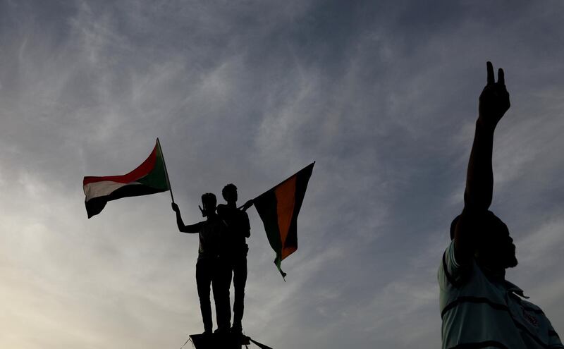 Sudanese demonstrators protest outside the Defence Ministry in Khartoum. Reuters