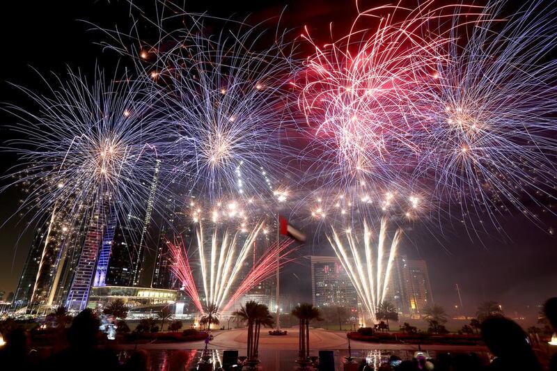 Fireworks light up the skies near Emirates Palace on New Year’s Eve in Abu Dhabi. Sammy Dallal / The National